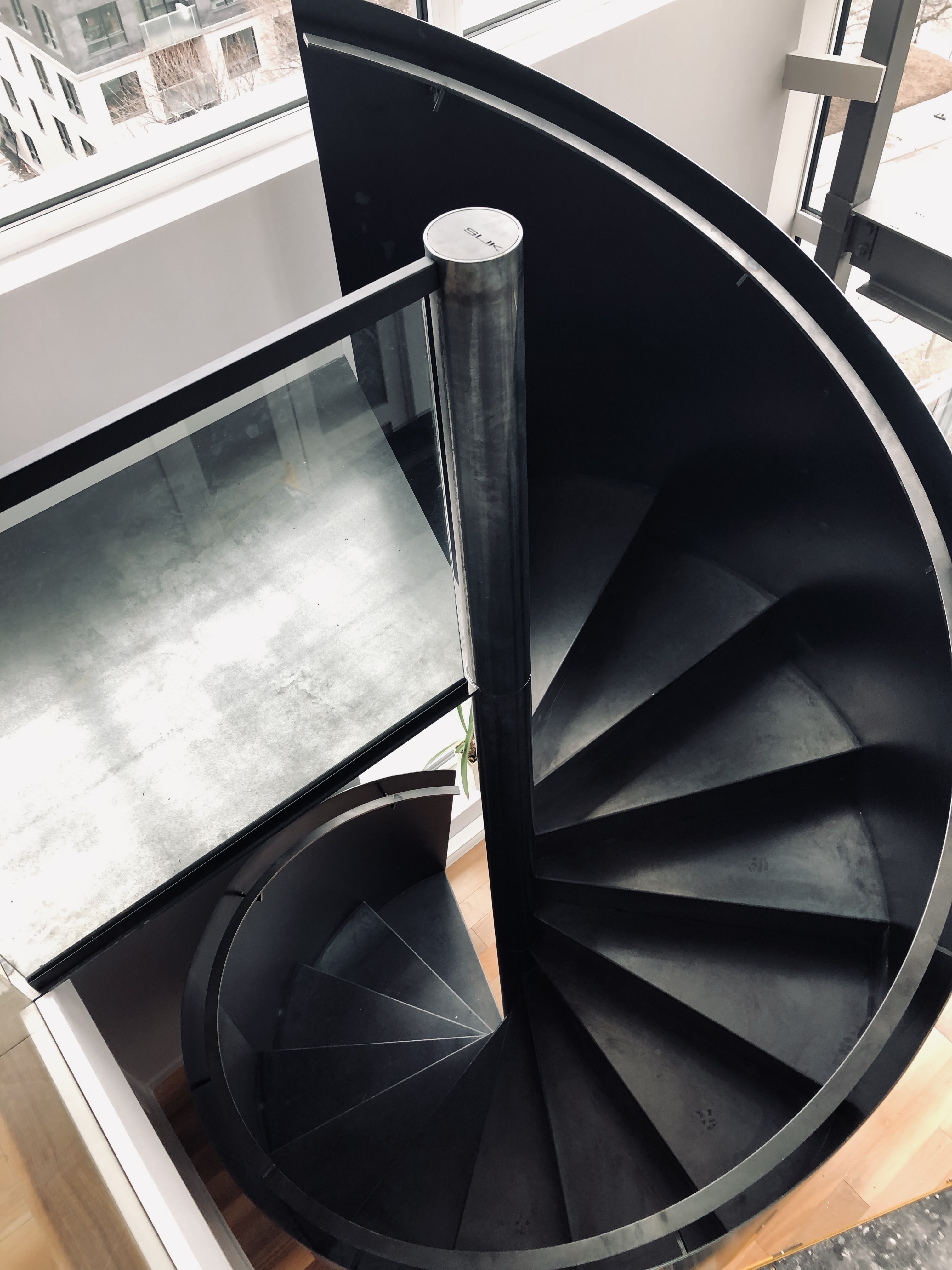 Escalier double révolution SLIK Entreprise – une touche de modernité signée SLIK Entreprise.