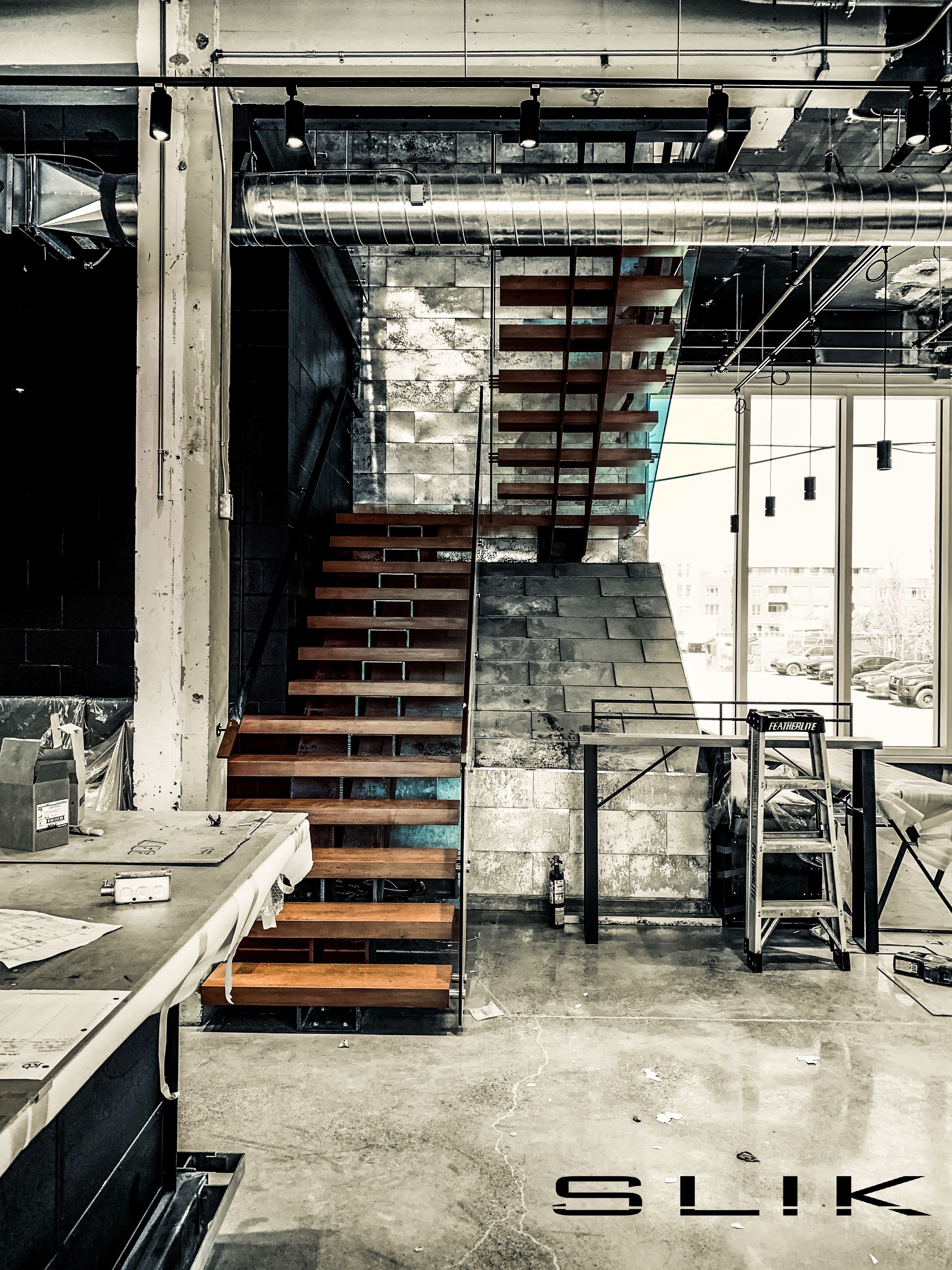 Projet escalier architecturaux avec matériaux haut de gamme.